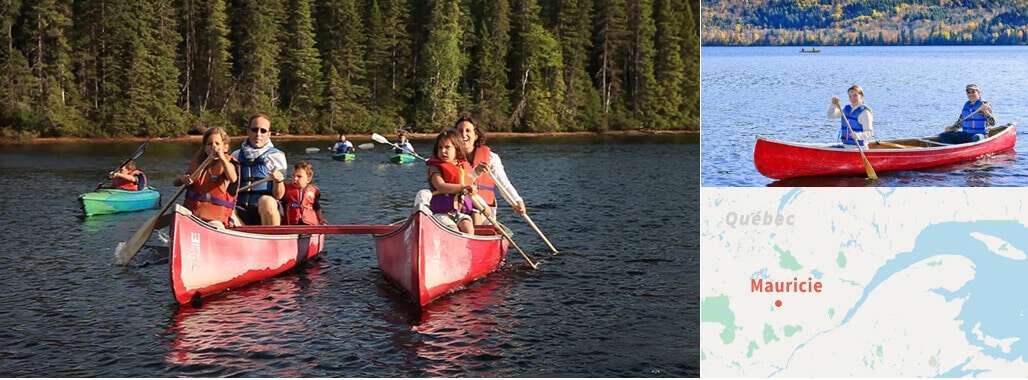 Famille en canot sur un lac du Québec